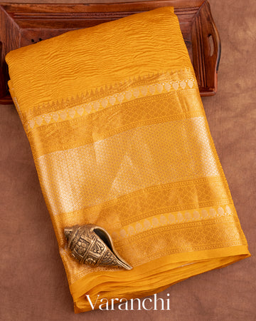 Bright Turmeric Yellow Pure Crush Tissue Kora Silk Saree