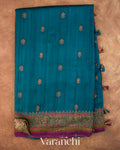Peacock Blue Tricolour Bordered Pure Raw Silk Handloom Saree