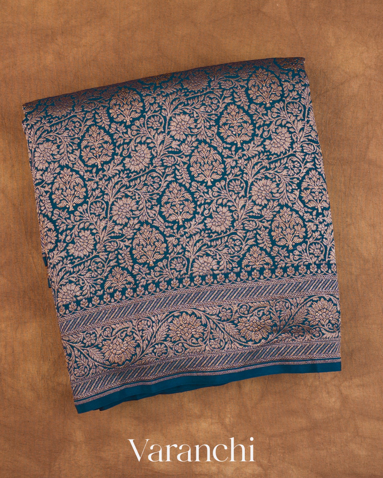 Peacock Blue Floral Brocade Pure Crepe Silk Handloom Saree