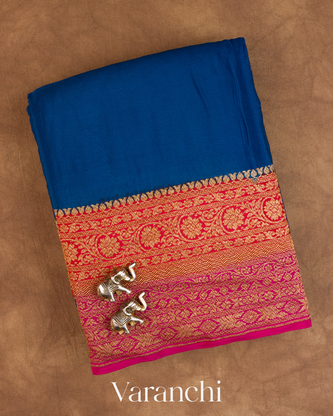 Peacock Blue Floral Bordered Pure Crepe Silk Handloom Saree