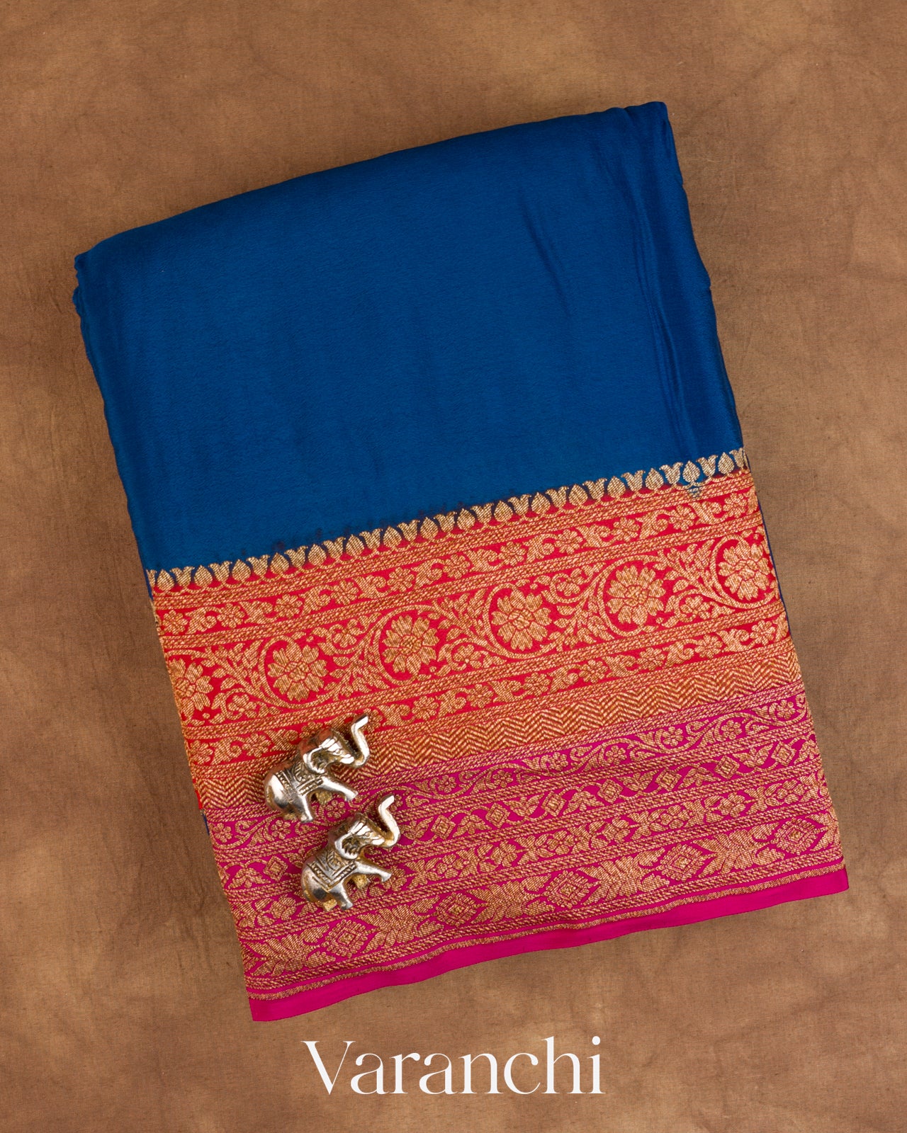 Peacock Blue Floral Bordered Pure Crepe Silk Handloom Saree