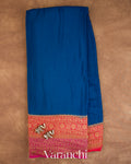 Peacock Blue Floral Bordered Pure Crepe Silk Handloom Saree