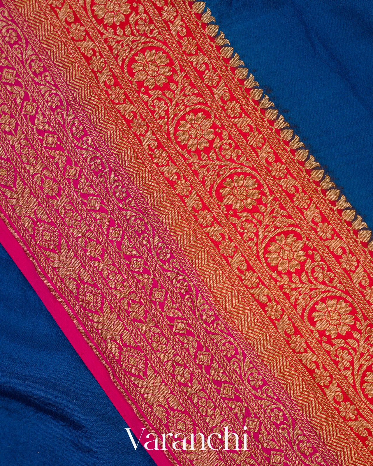 Peacock Blue Floral Bordered Pure Crepe Silk Handloom Saree