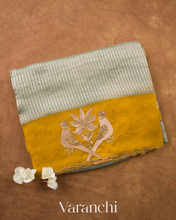 Powder Blue Tissue Striped and Embroidered Pure Kora Silk Saree — Folded