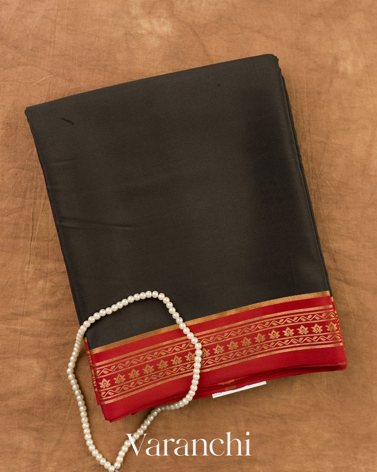 Jet Black Pure Mysore Crepe Silk Saree — Folded
