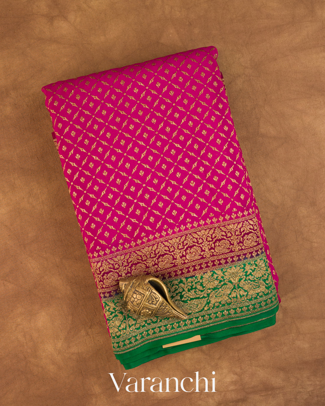 Rani Pink Jaal Pure Crepe Silk Handloom Saree — Folded