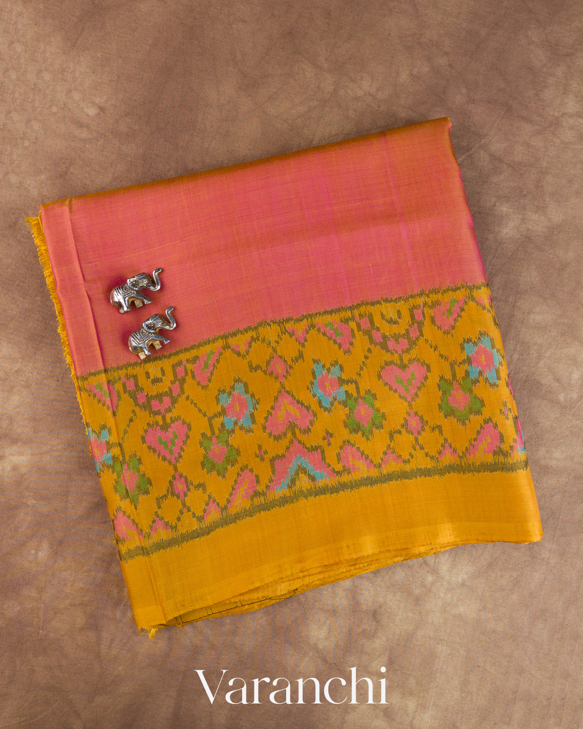 Muted Pink Pure Rajkot Patola Silk Handloom Saree — Folded