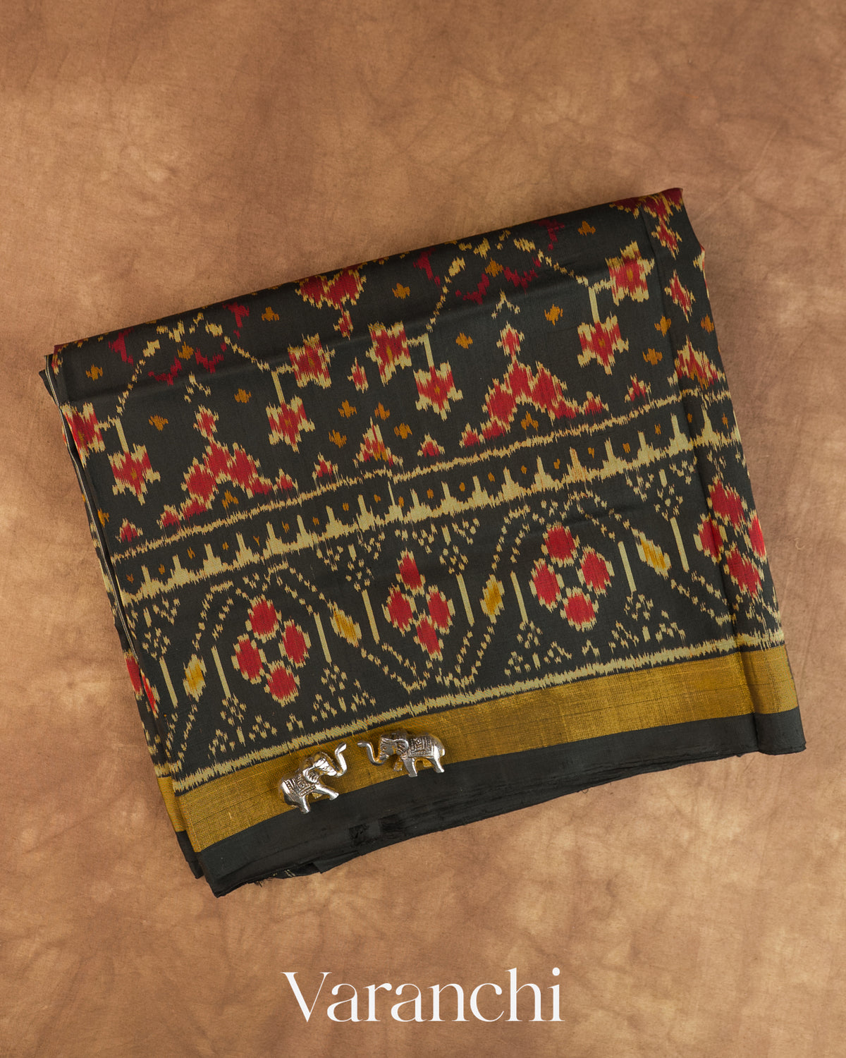 Jet Black Pure Rajkot Patola Silk Handloom Saree — Folded