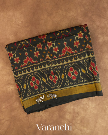 Jet Black Pure Rajkot Patola Silk Handloom Saree — Folded