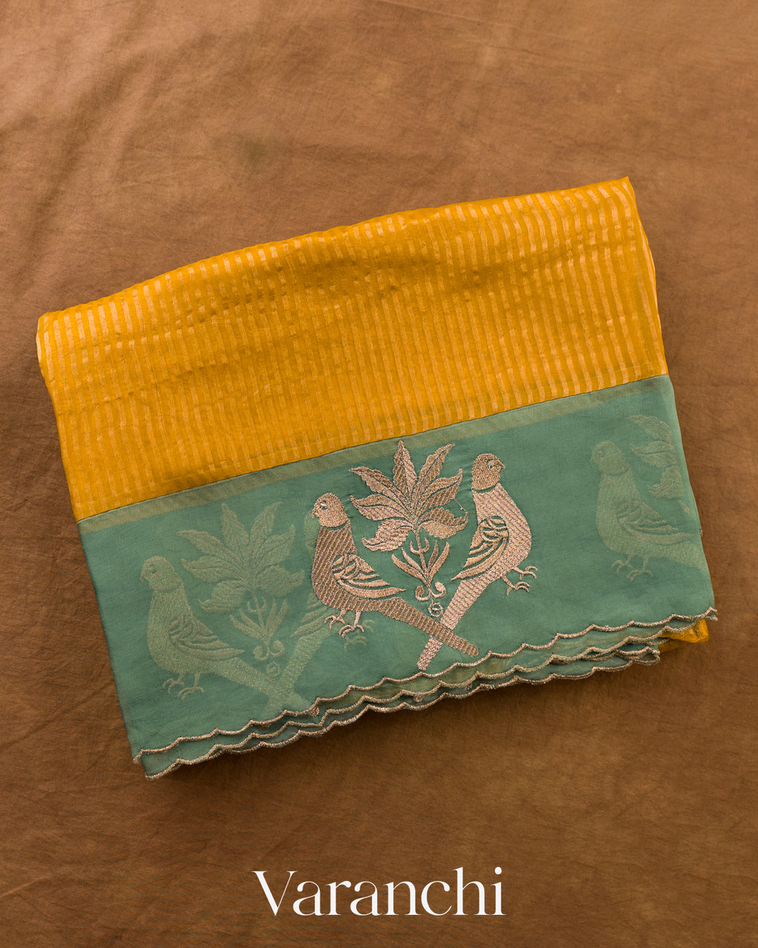 Deep Mango Yellow Bird Embroidered Pure Kora Silk Saree — Folded