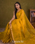Mustard Yellow Sequin Checkered Pure Muslin Silk Handloom Saree — Draped