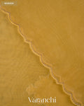 Muted Yellow Paisley Applique and Scalloped Bordered Pure Kora Silk Saree — Border