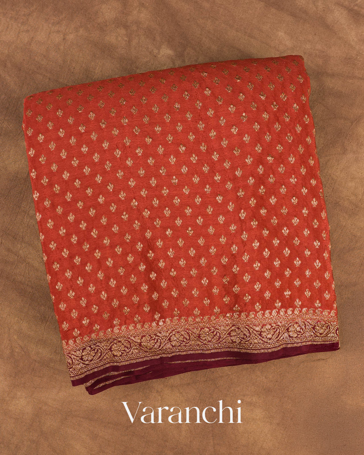 Rust Orange Pure Crepe Silk Handloom Saree — Folded